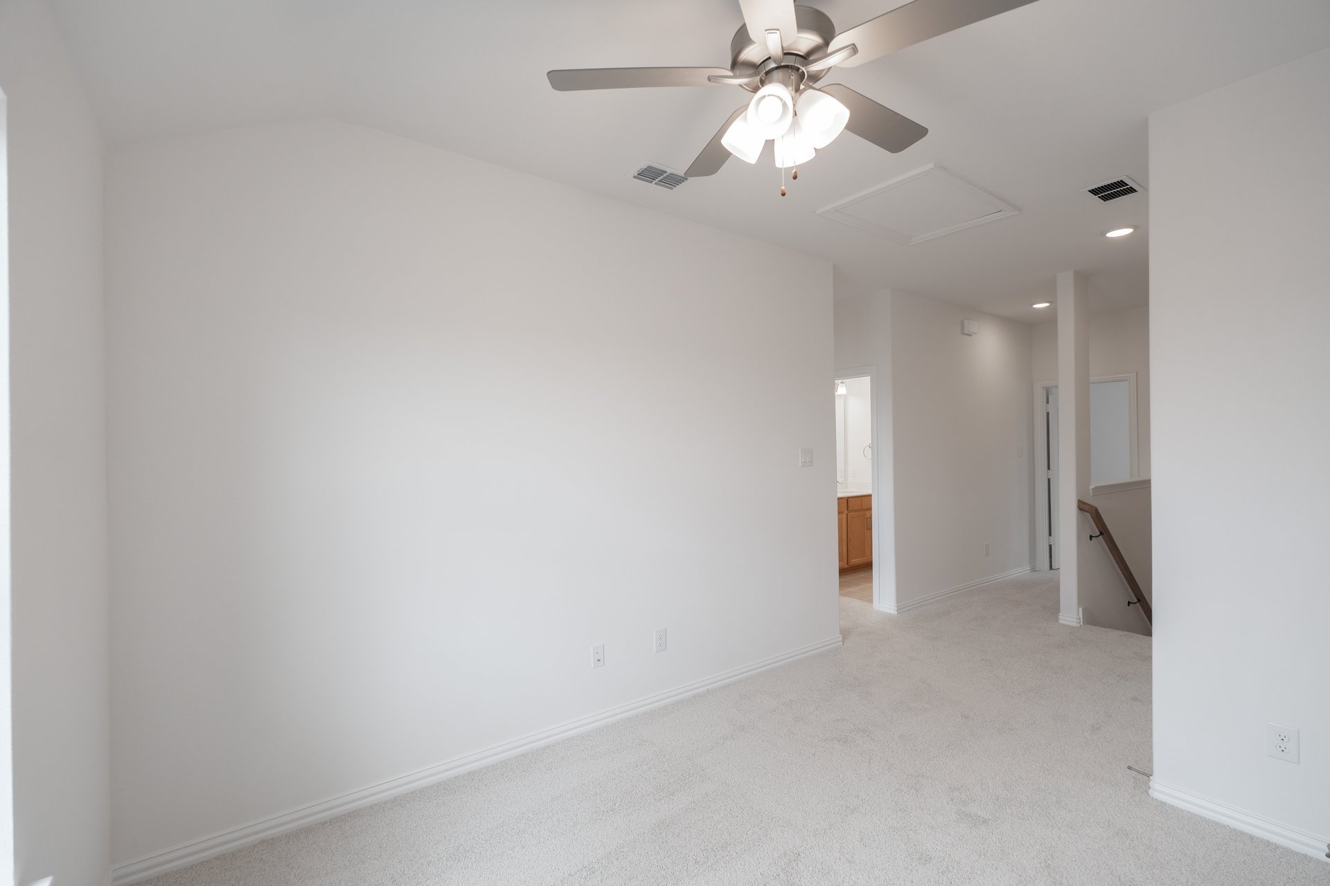 open gameroom with carpet and ceiling fan