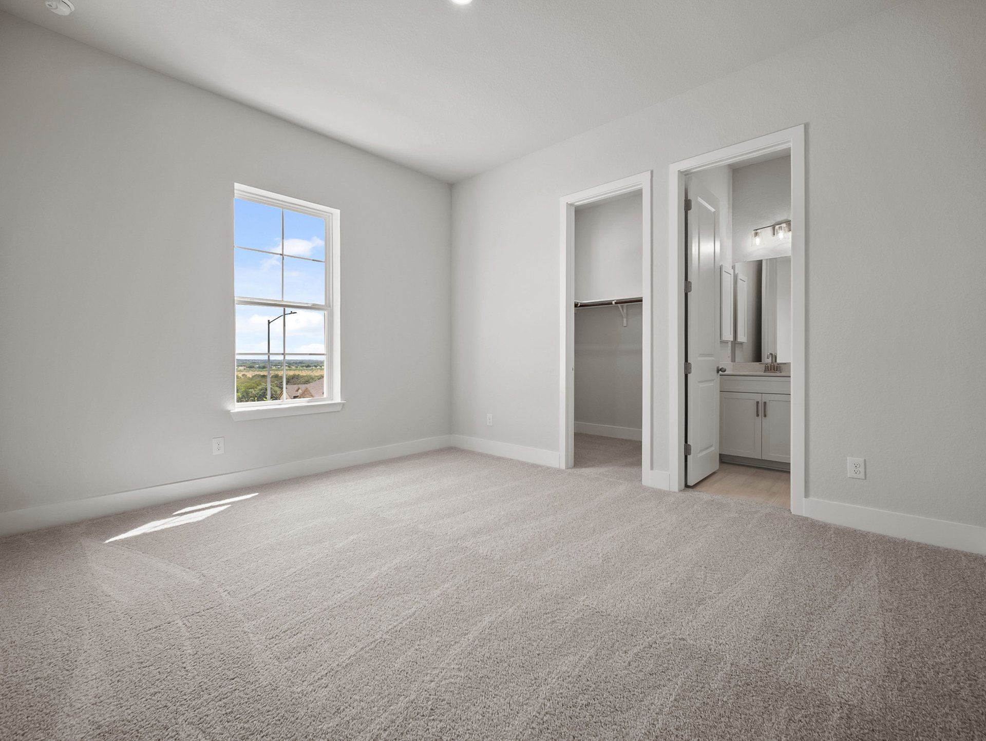 bedroom with carpet, a window & recessed lighting