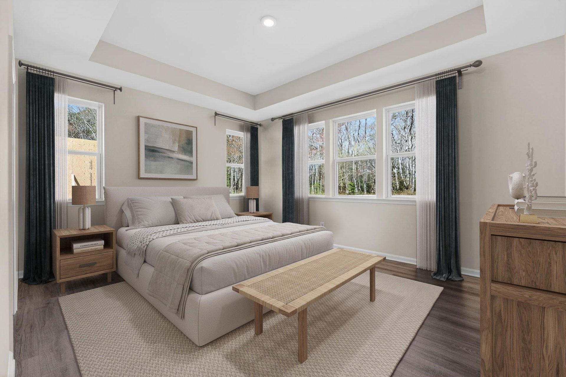 primary bedroom with tray ceiling