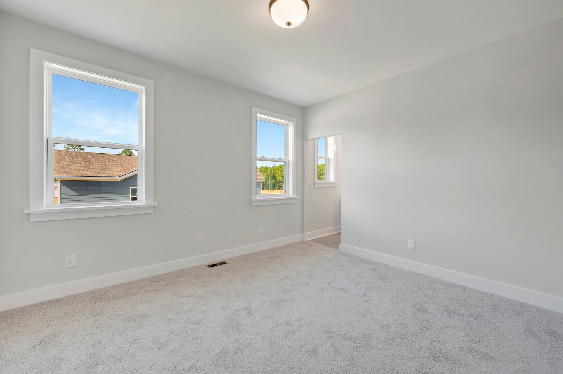 secondary bedroom with carpet