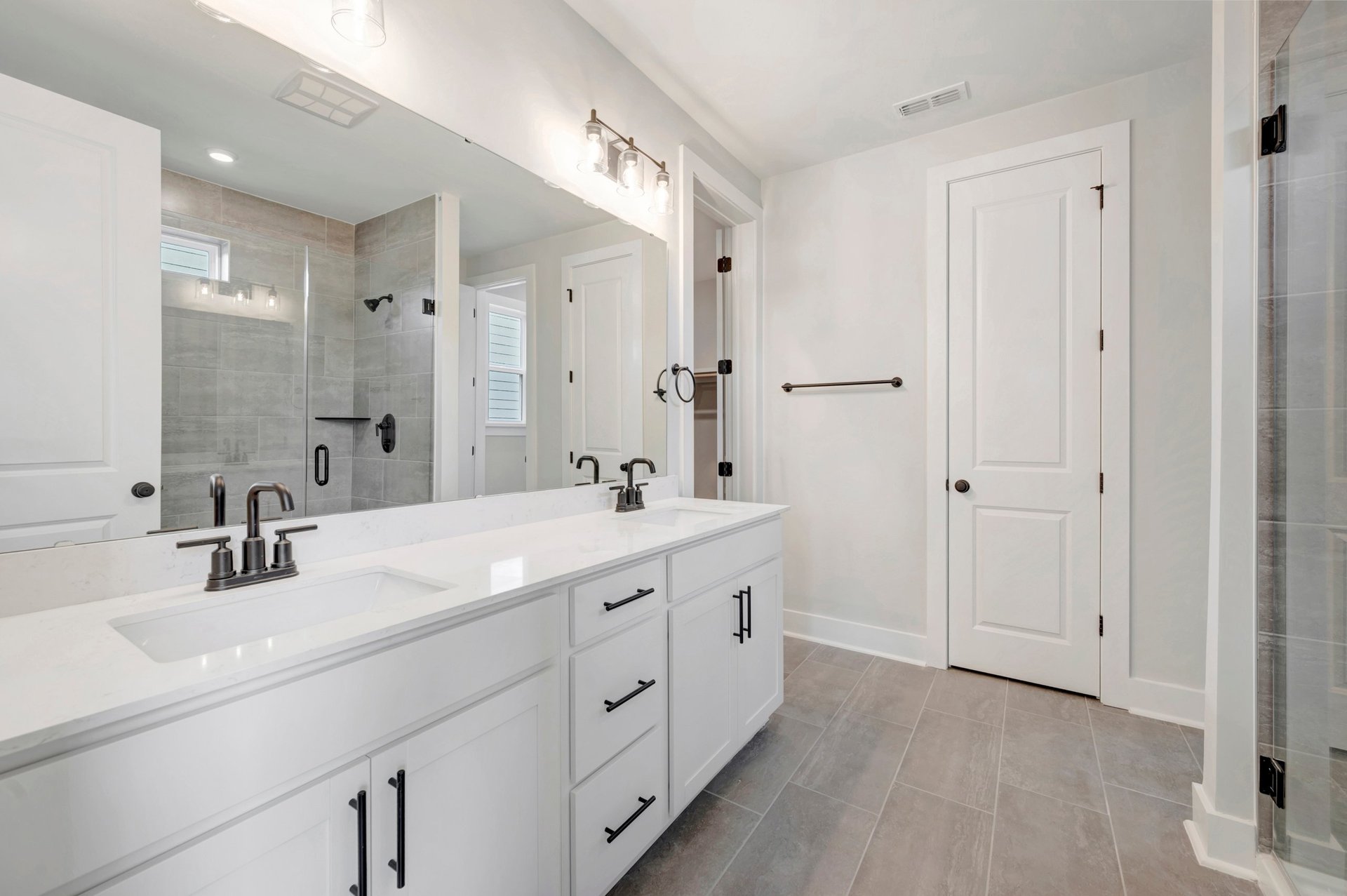 primary bath with two sinks