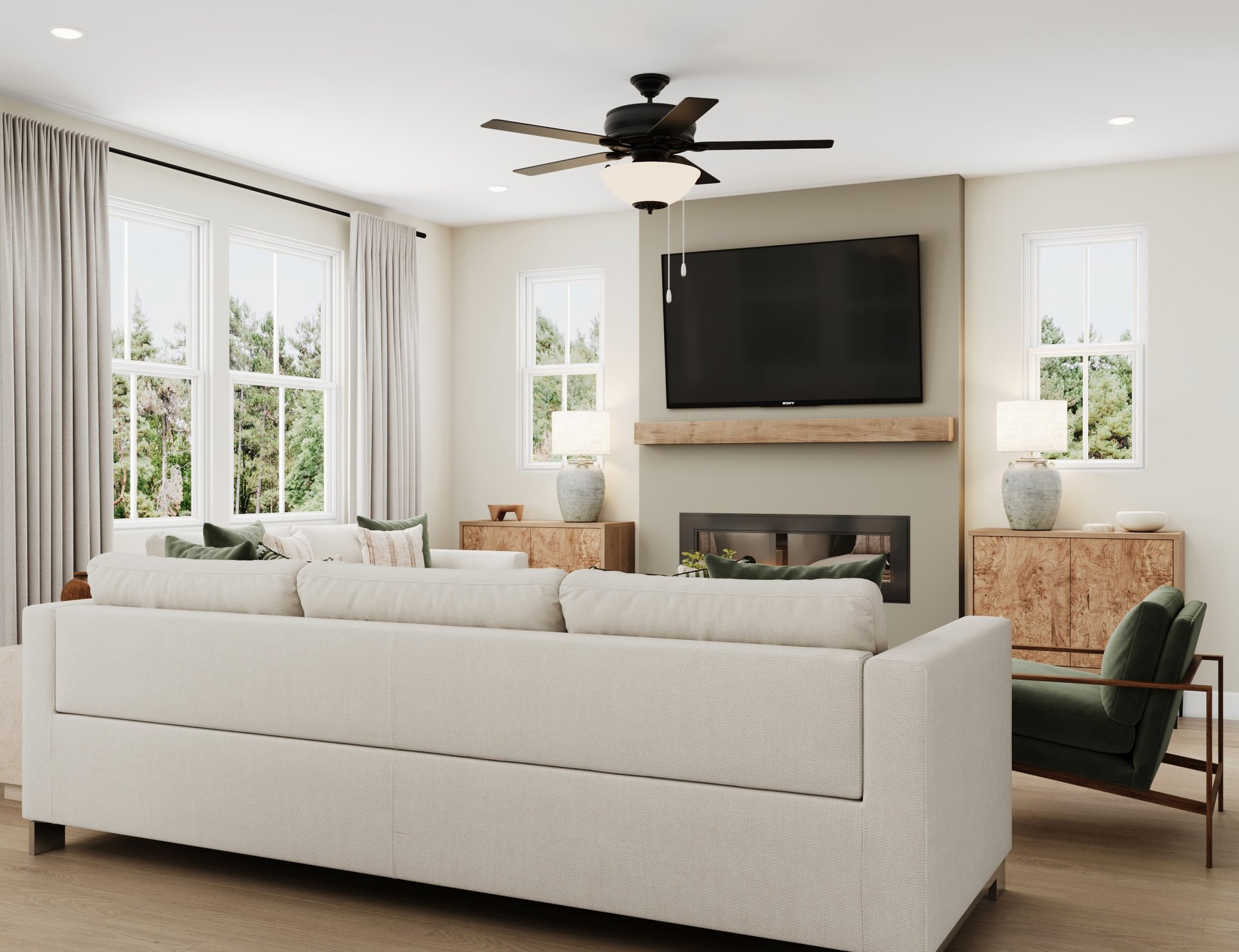 great room with electric fireplace and windows