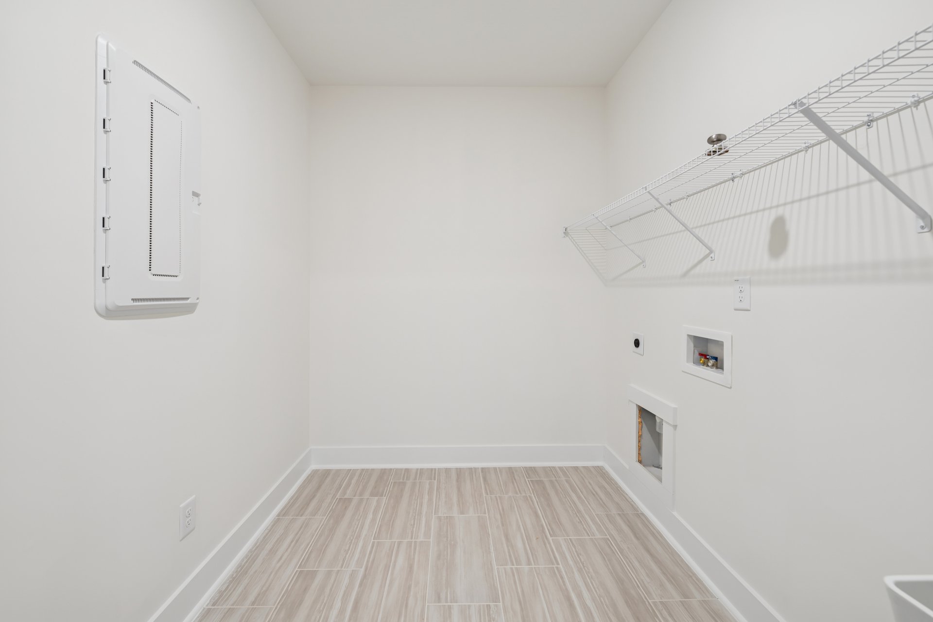 laundry room with a wire shelf