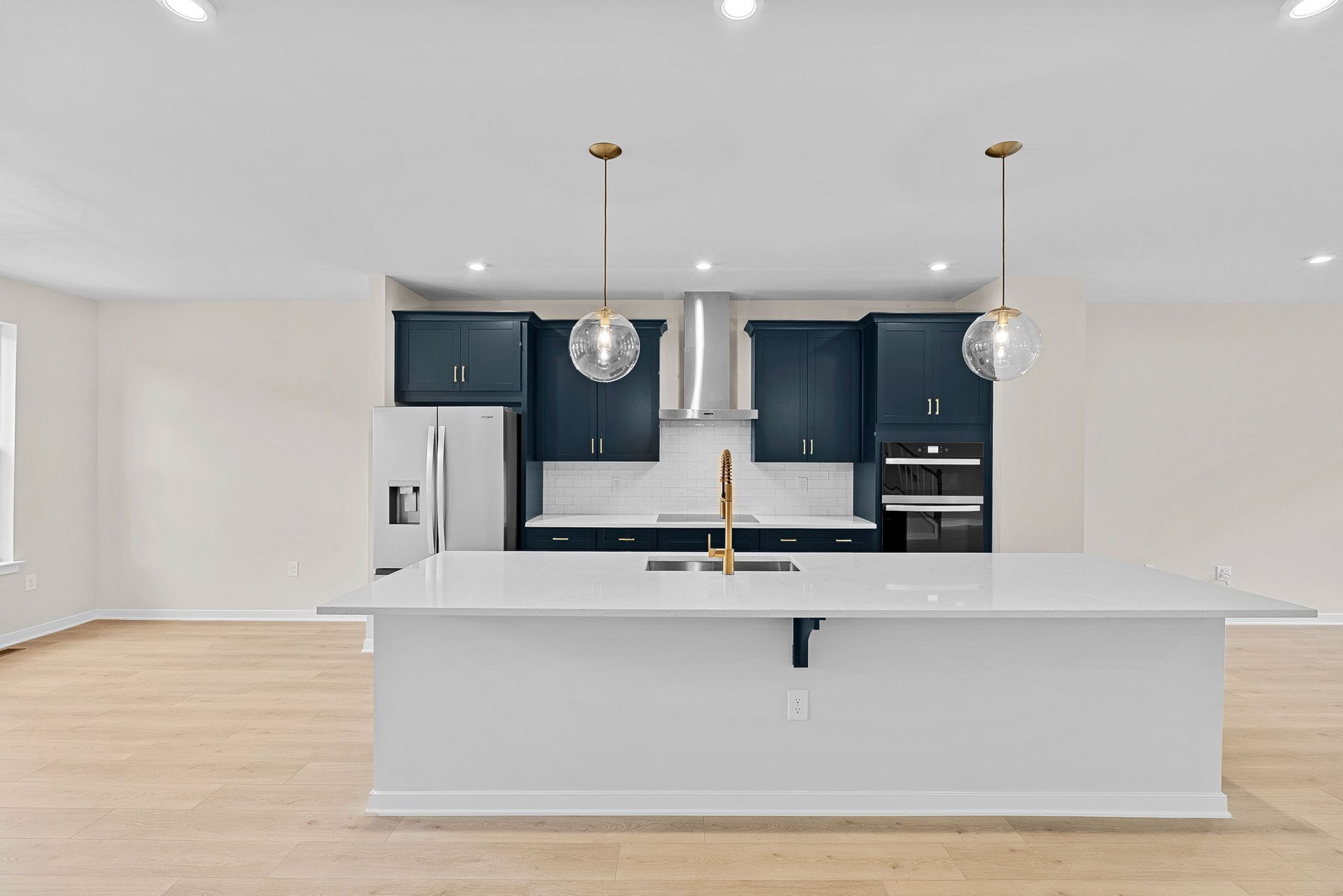 kitchen with an island and blue cabinets