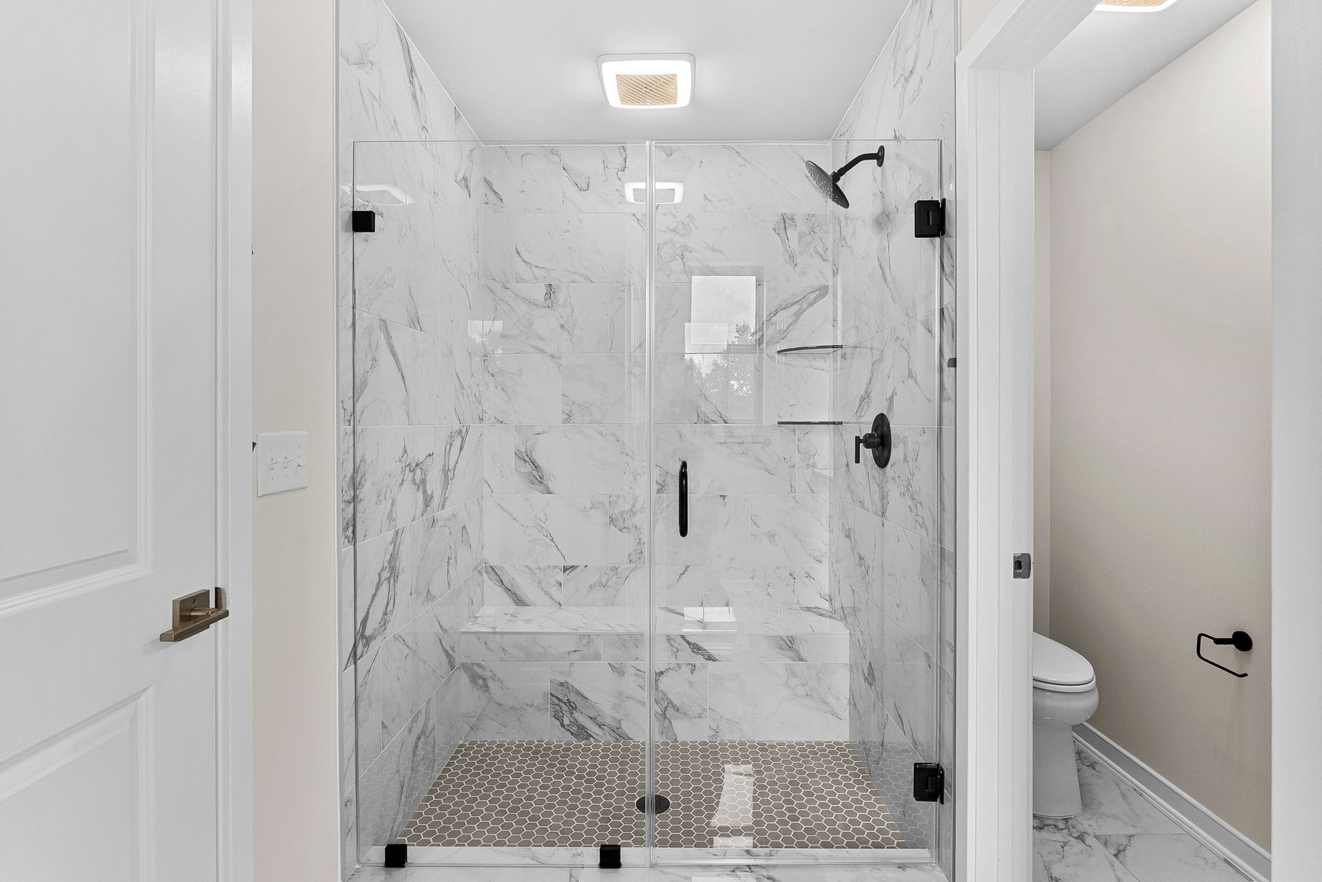 primary bathroom with an oversized shower