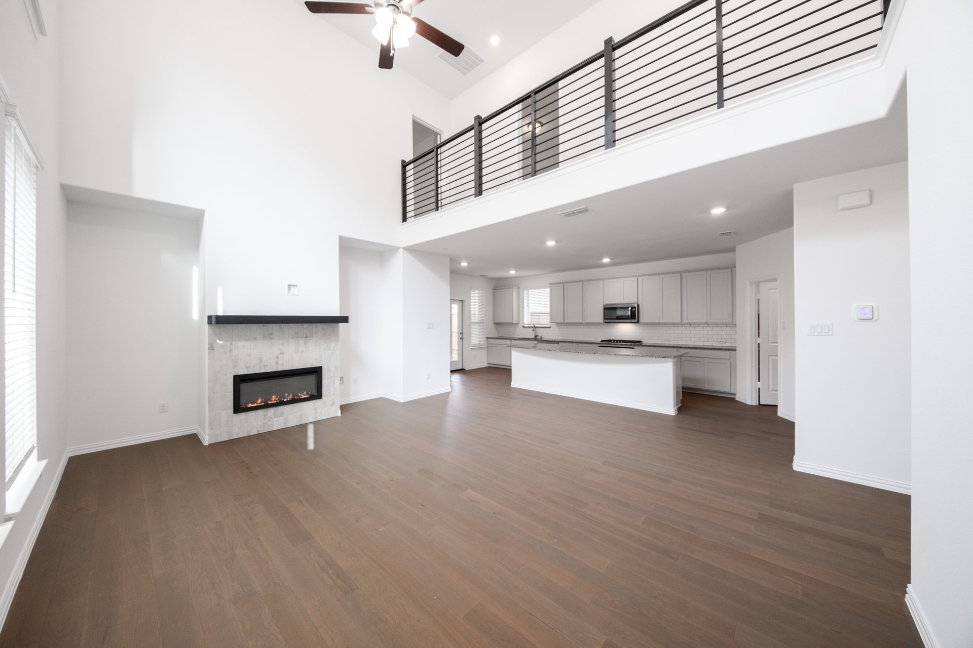 open great room with two-story ceilings