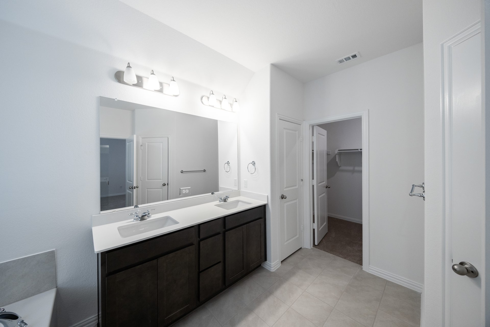 primary bathroom with double sinks