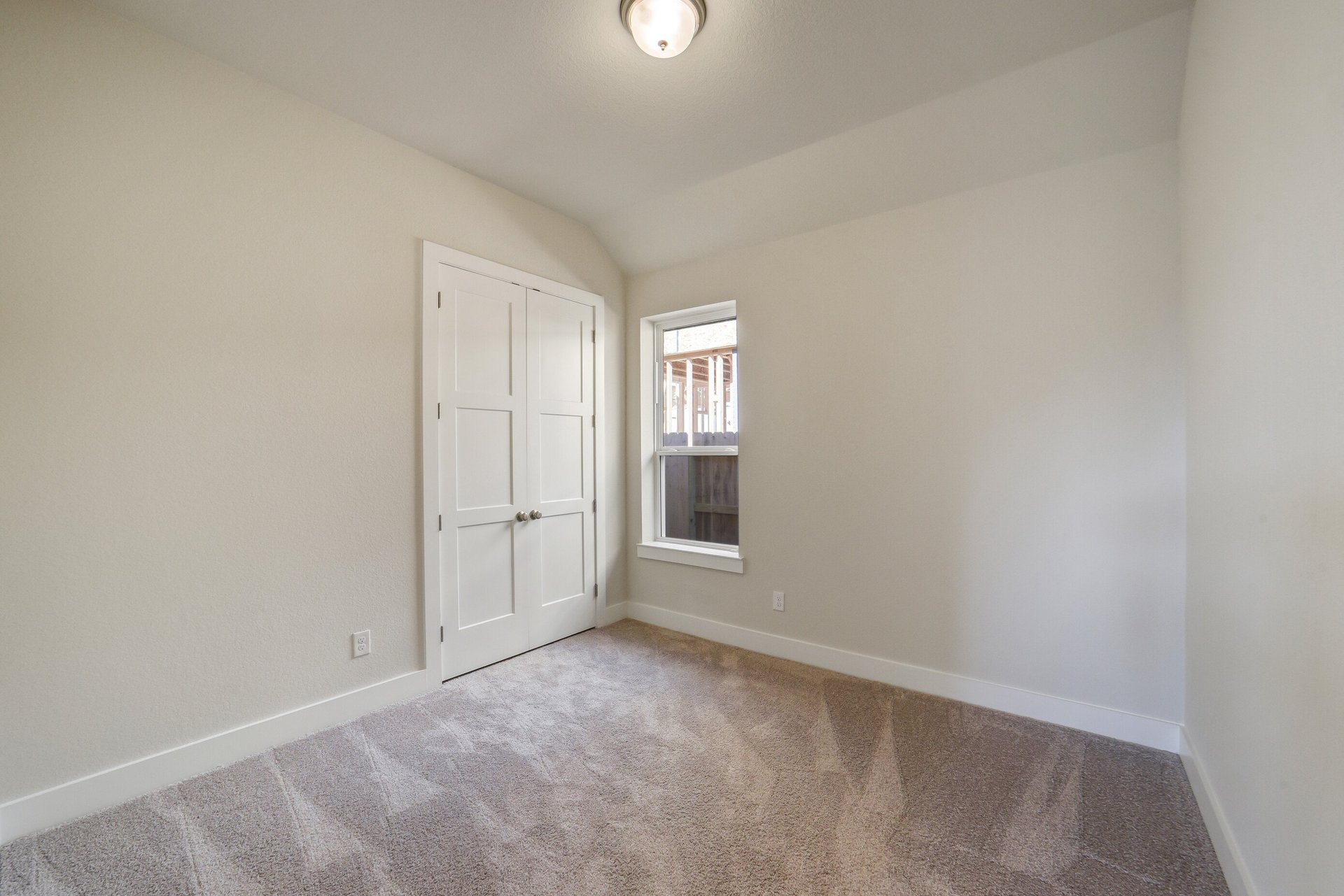 guest bedroom with carpet