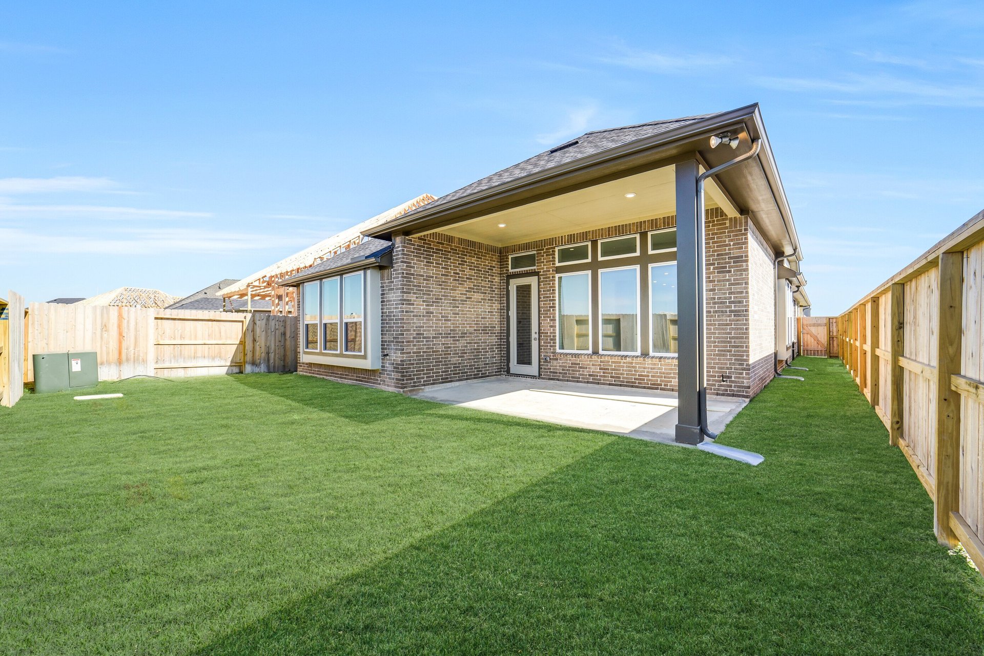 backyard of home with covered patio