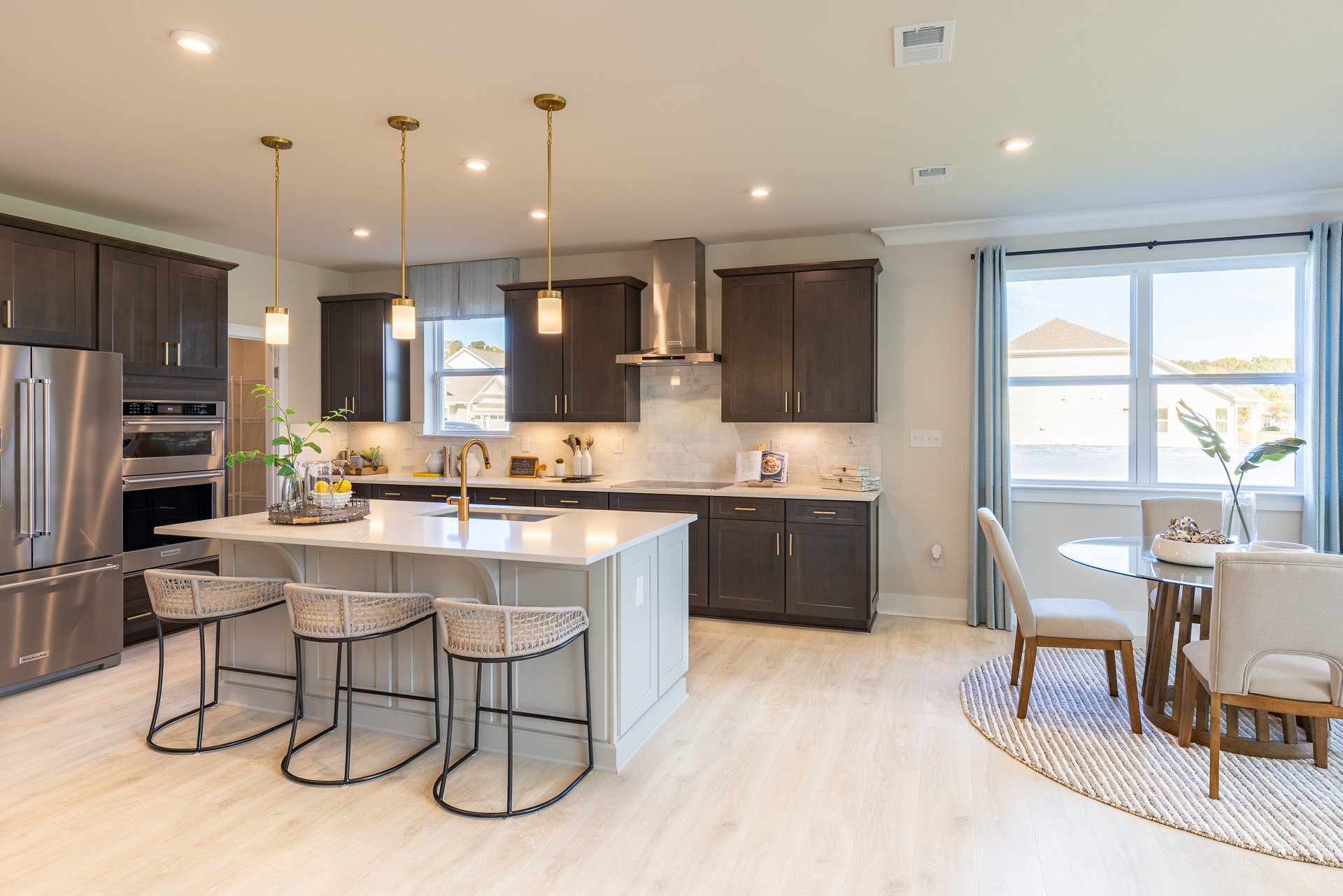 kitchen with a center island extending to the breakfast area