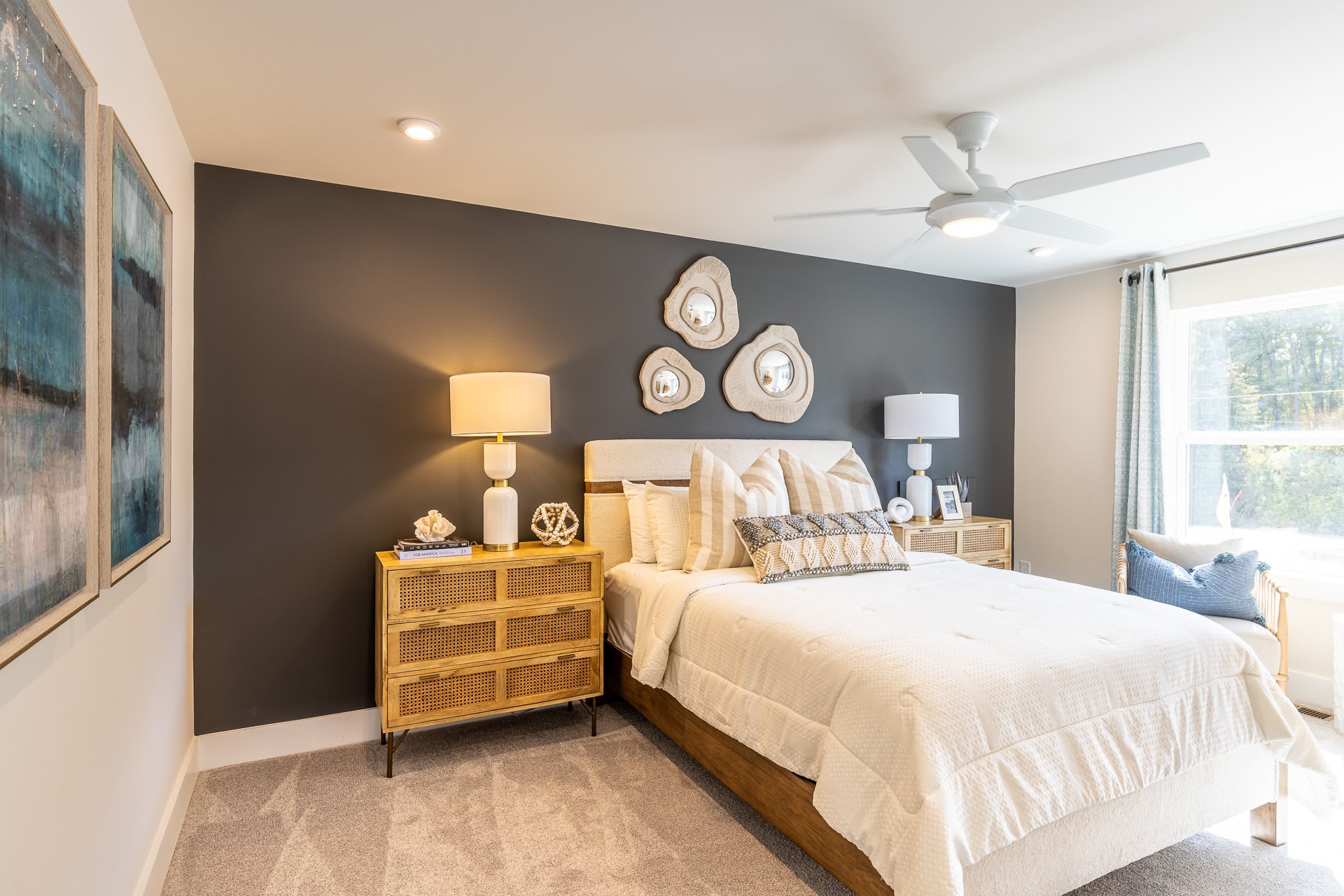 secondary bedroom with a dark statement wall