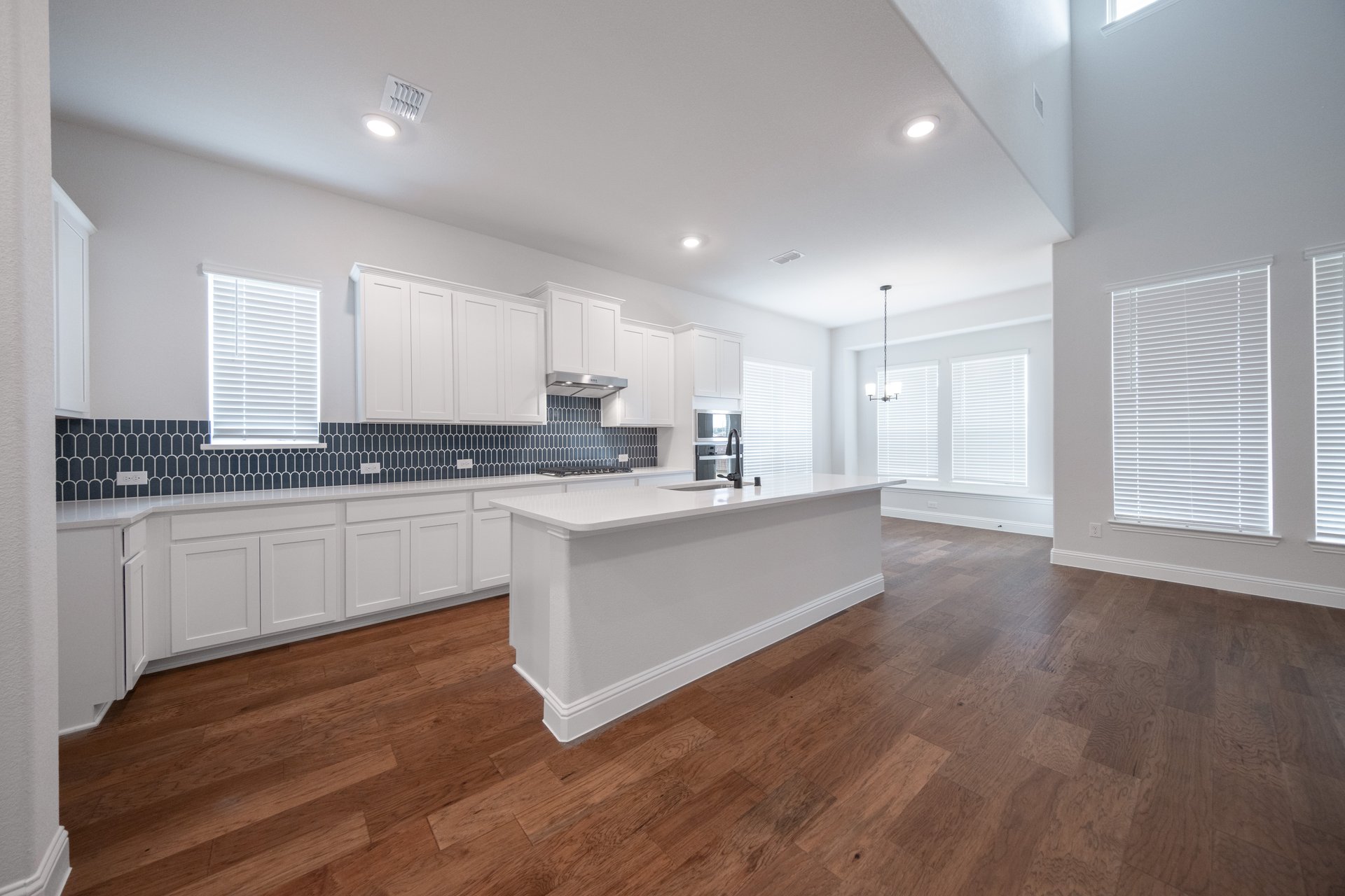 kitchen with large island and white countertops 