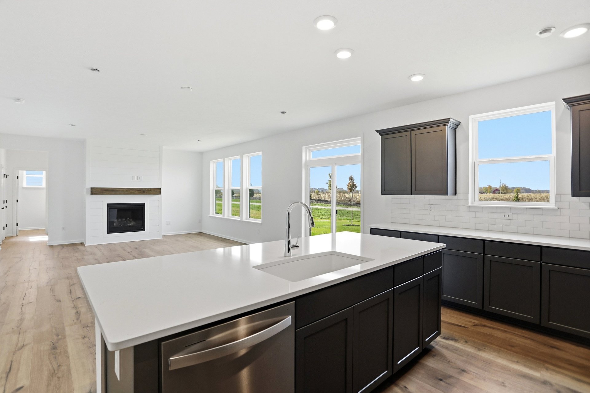 kitchen with large island overlooking into the great room