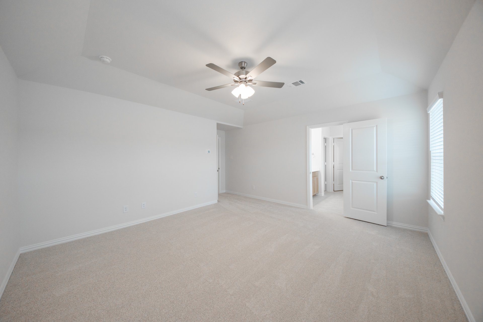primary bathroom with soaking tub and walk-in shower