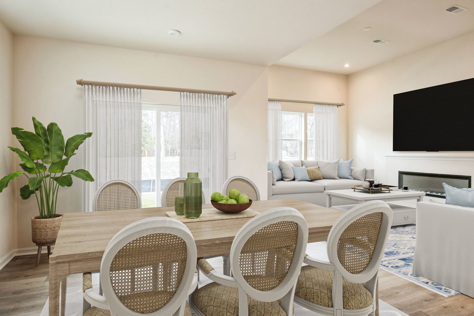 great room with a dining table and chairs