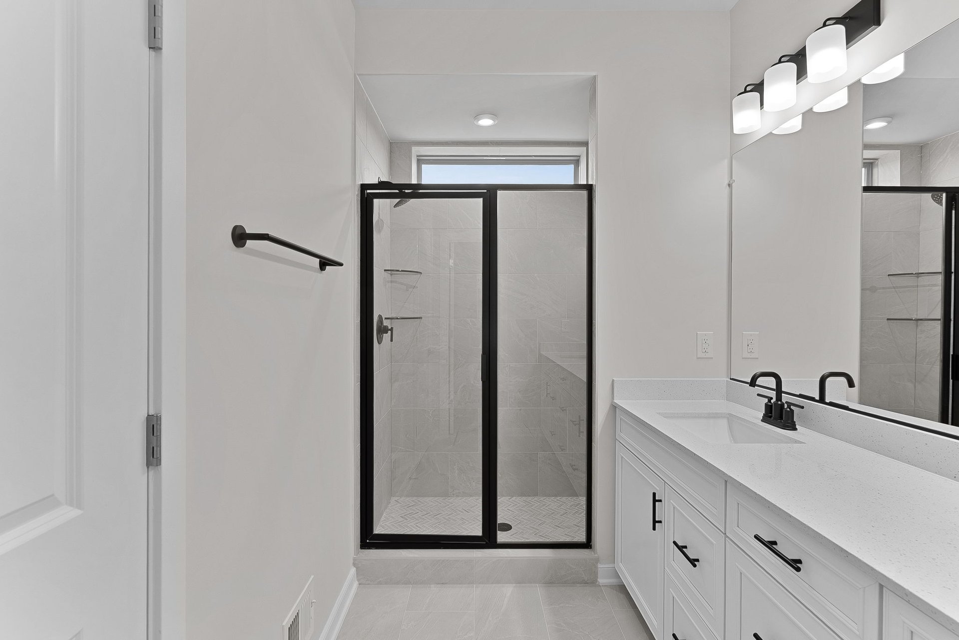primary bathroom with a walk-in shower