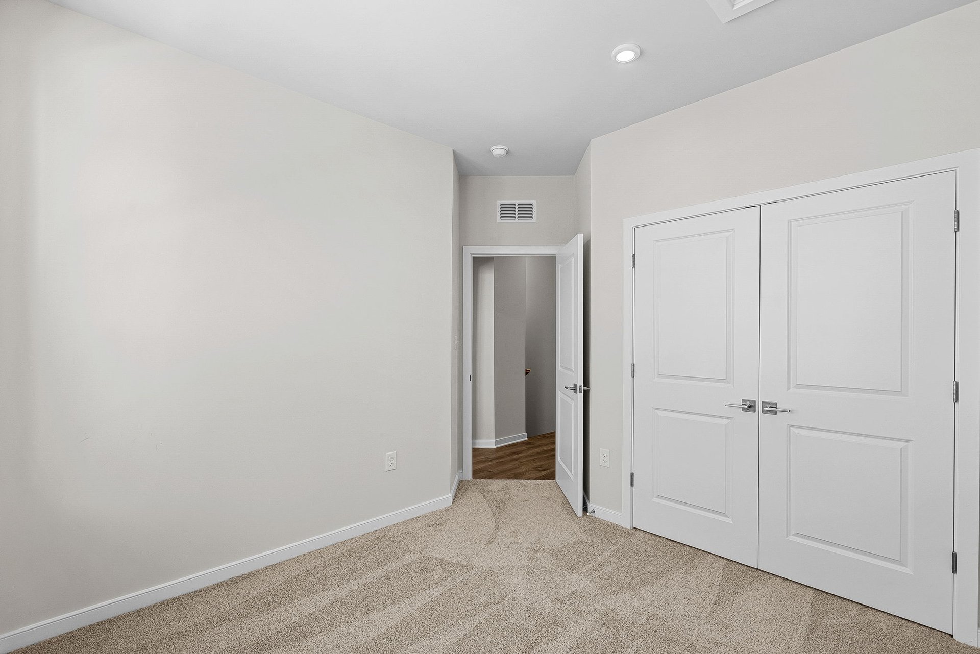 secondary bedroom with carpet