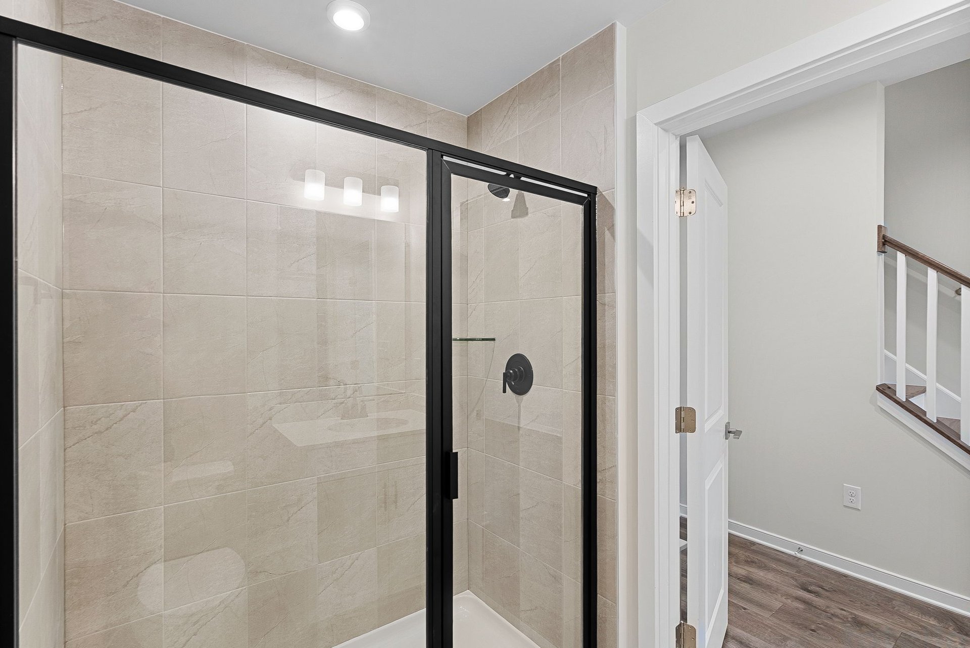 secondary bathroom with an oversized shower