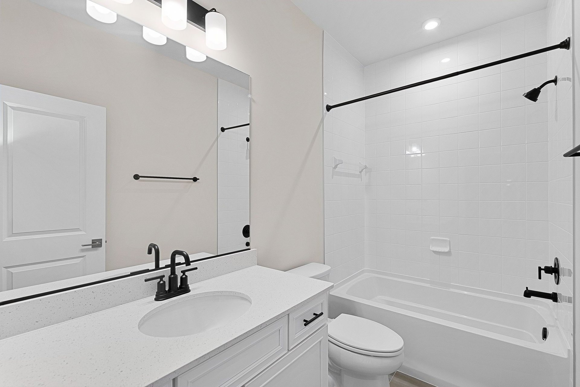 secondary bathroom with a shower & tub combo
