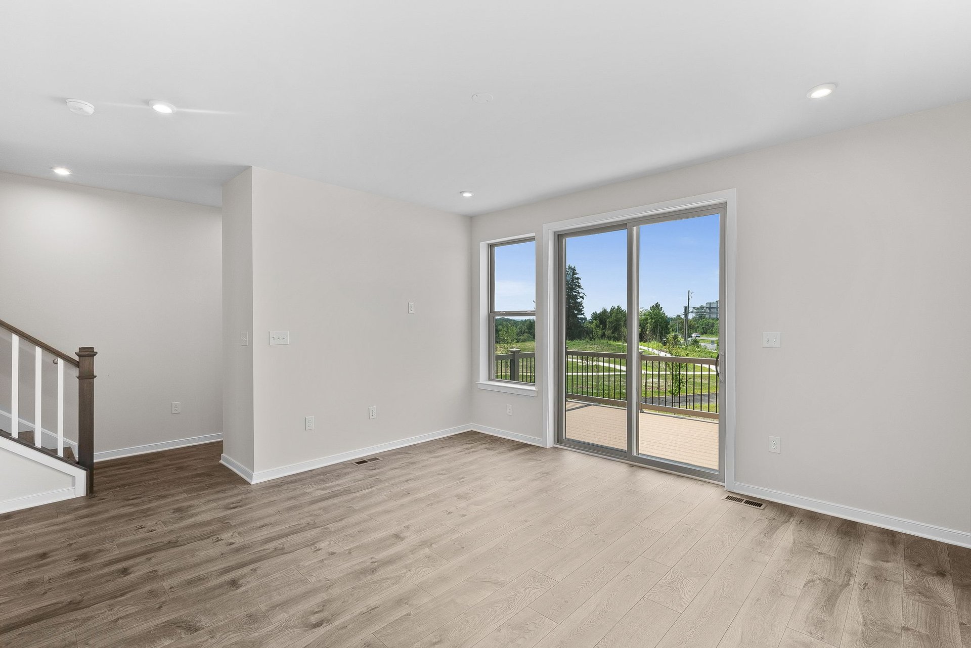 great room with access to the deck