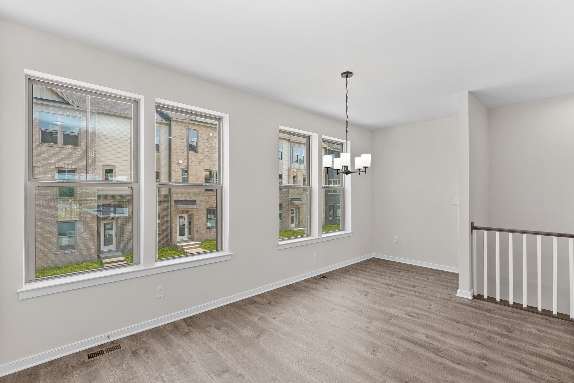 dining room with four windows