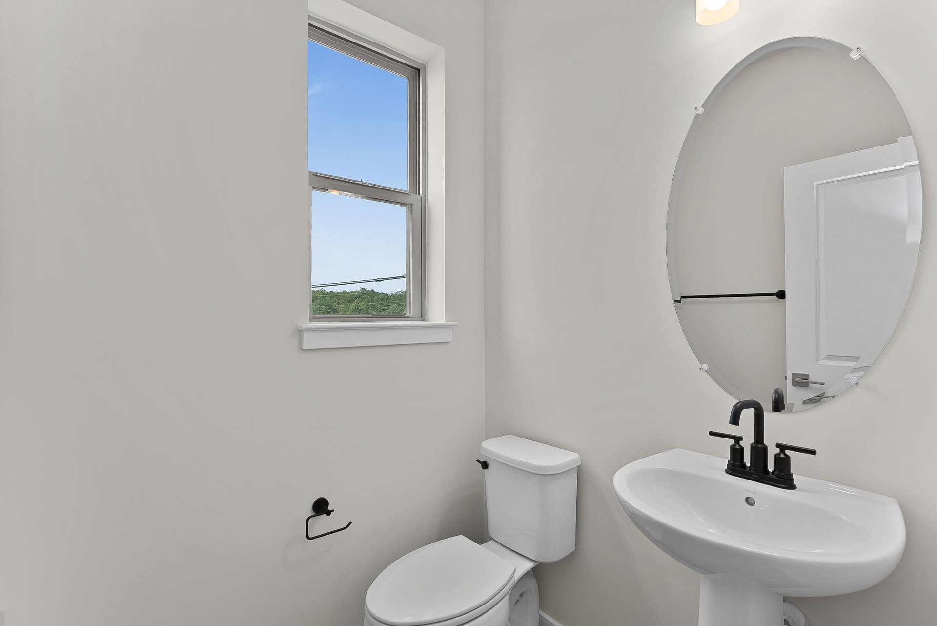 powder room with a window
