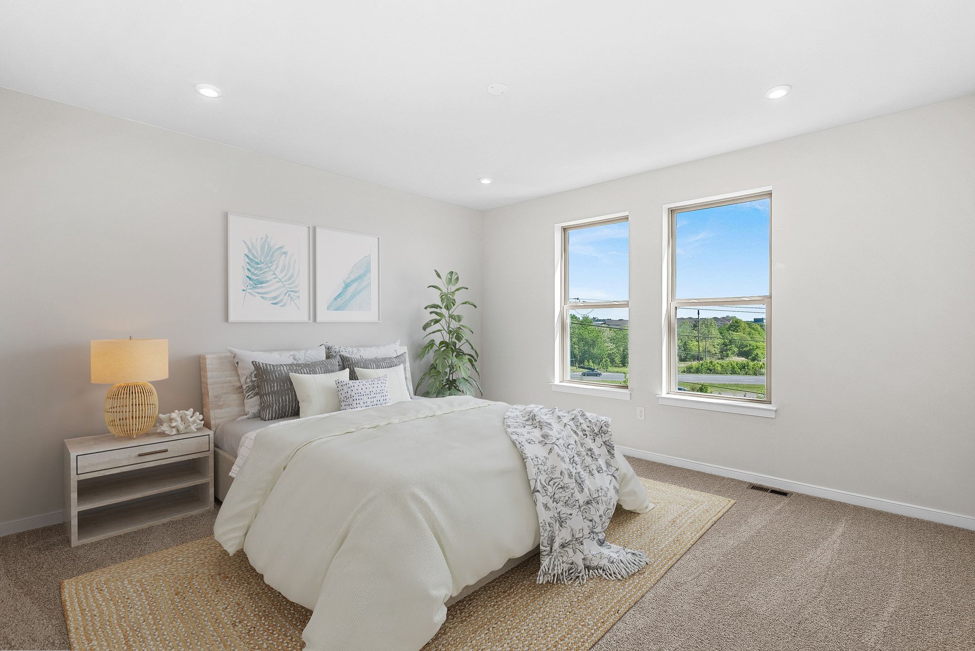 primary bedroom with two windows