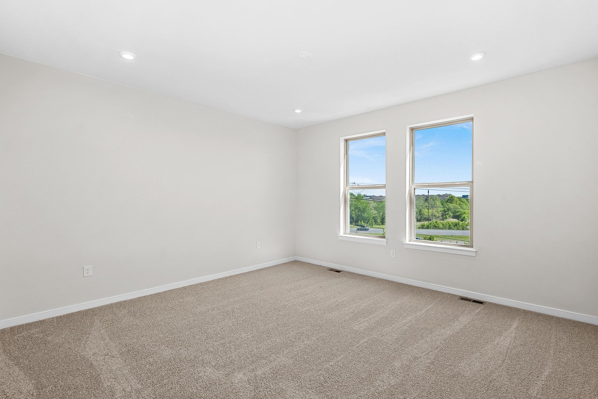 primary bedroom with natural light