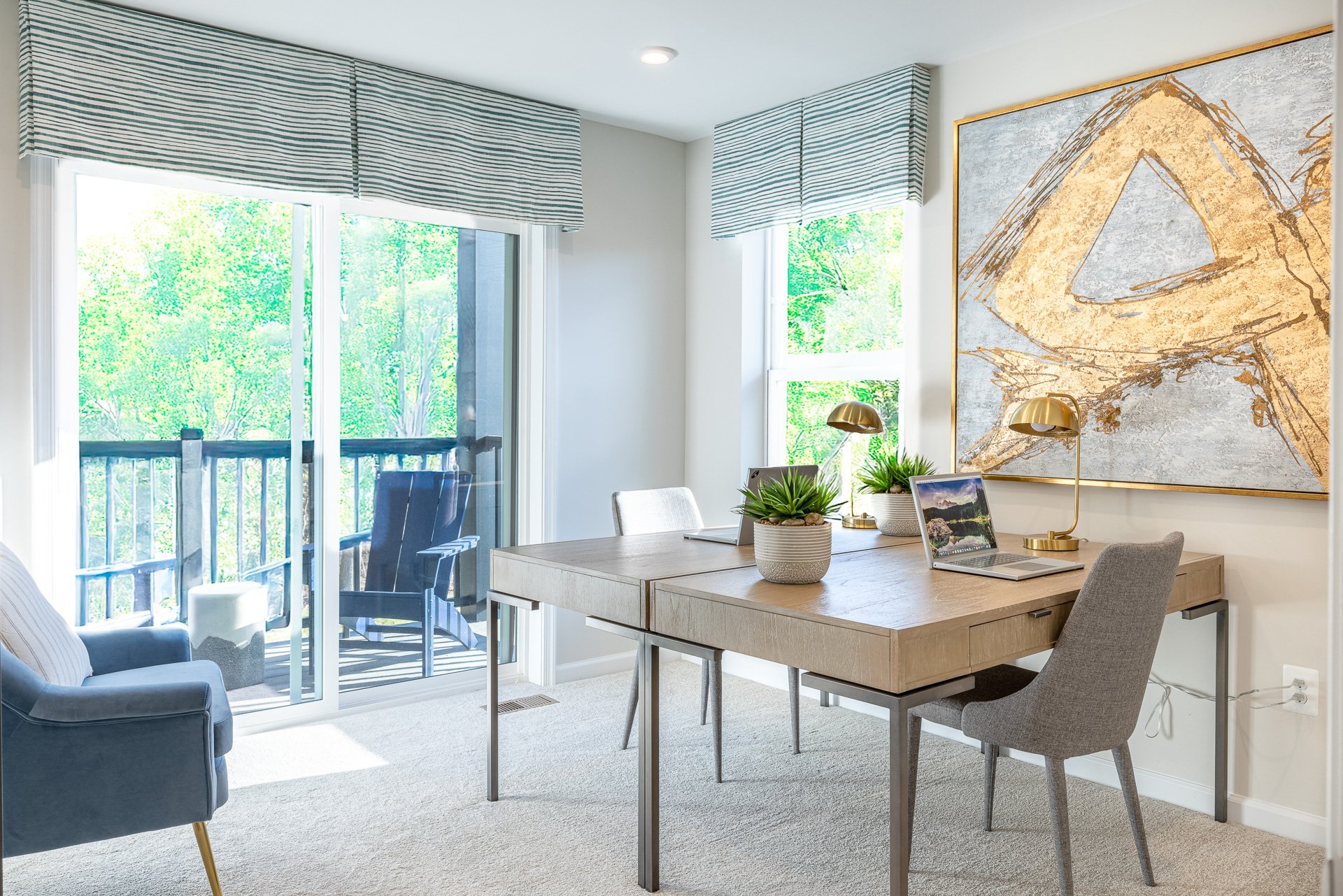 loft with a sliding glass door to the balcony
