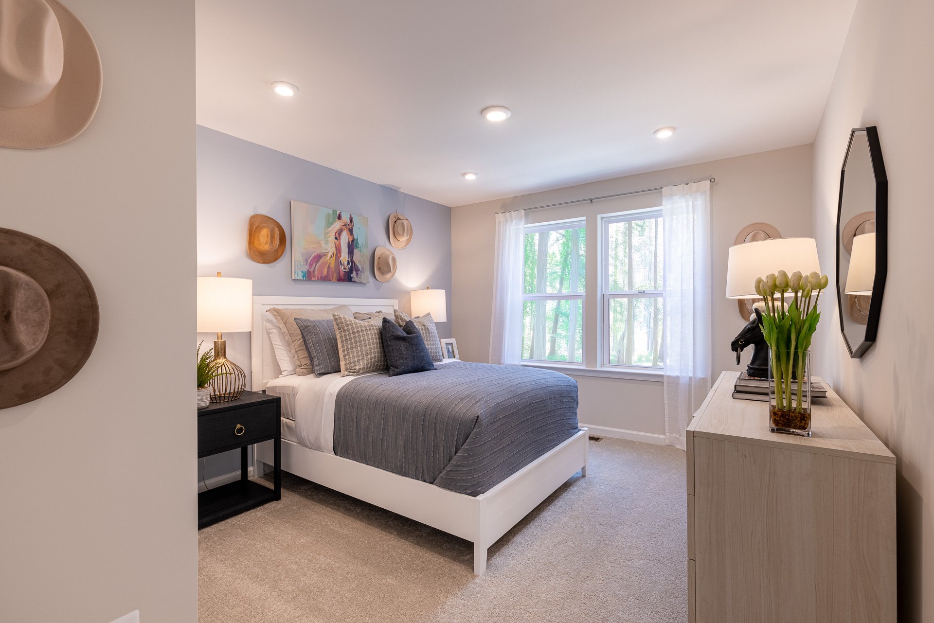 secondary bedroom with a full-sized bed and carpet