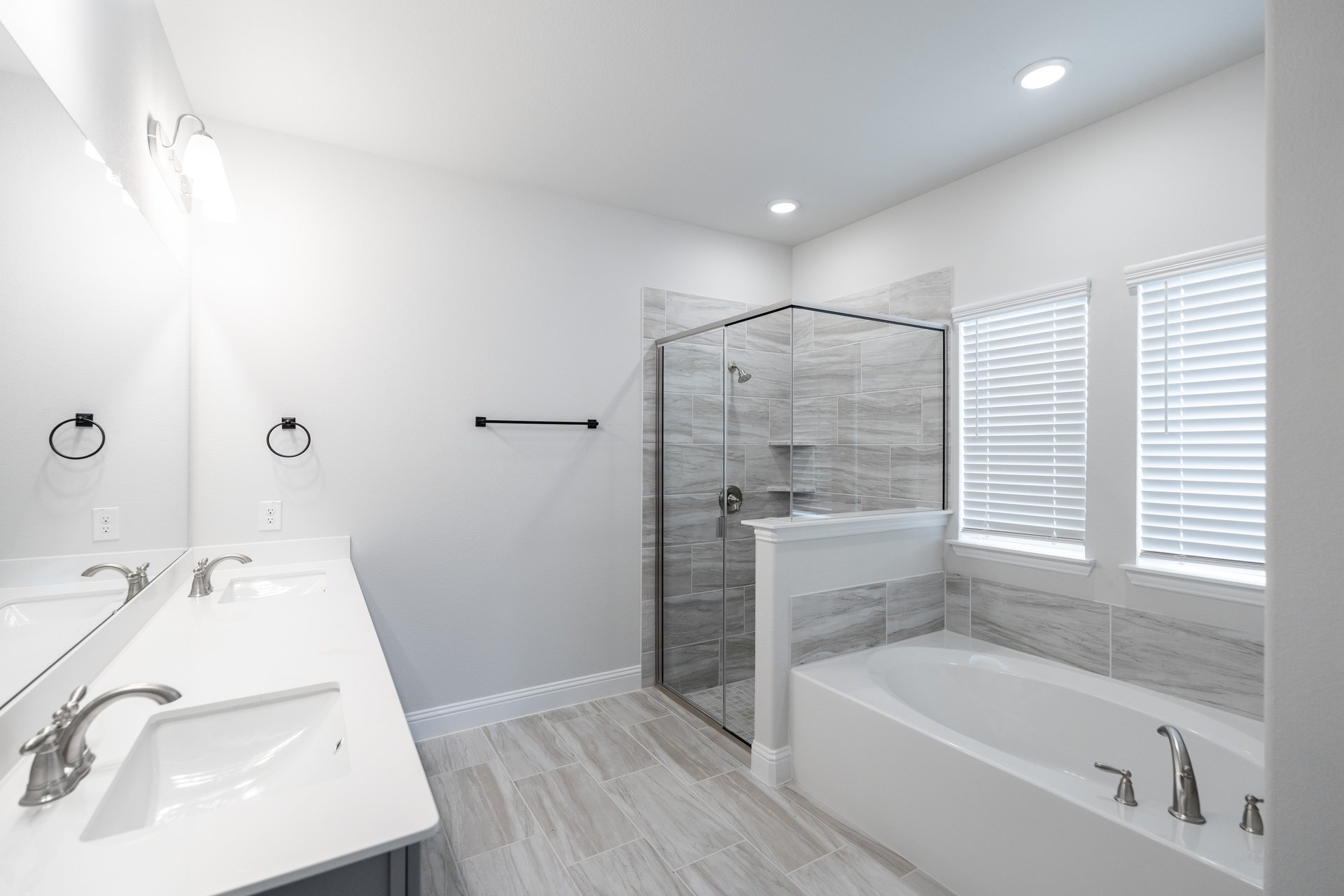 primary bathroom with soaking tub and walk-in shower