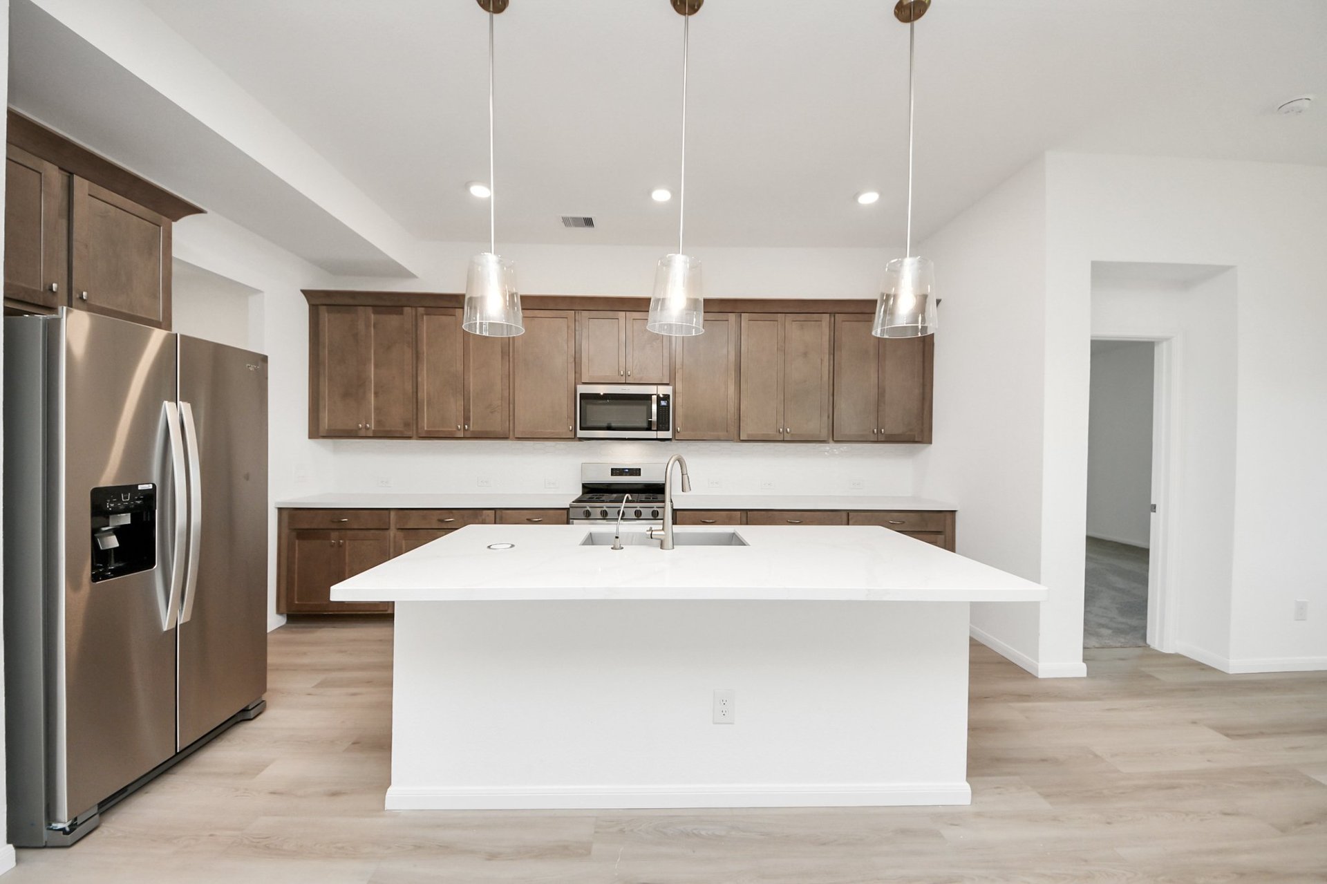 Kitchen with brown cabinets.