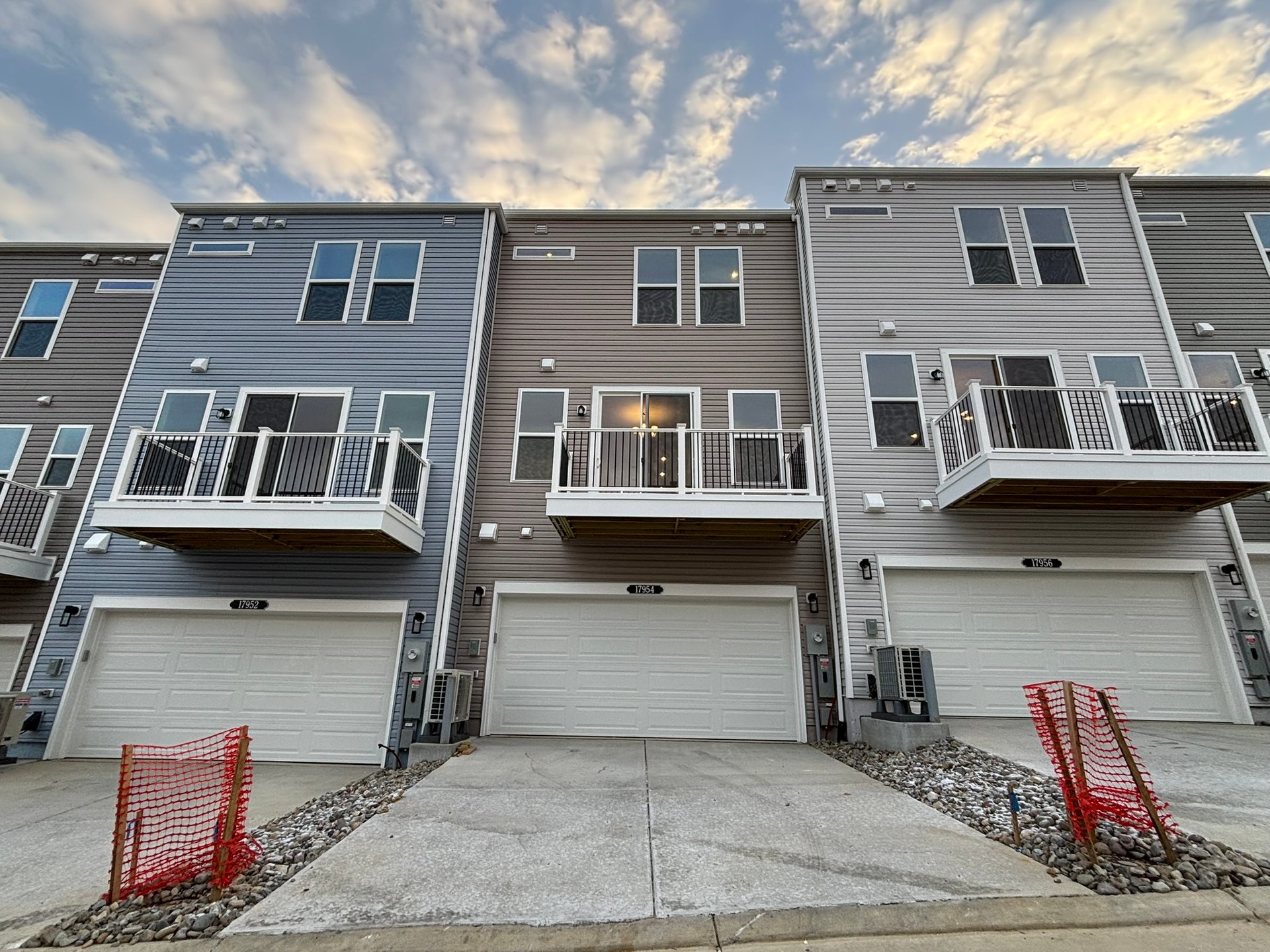 3-story townhome rear exterior with garage