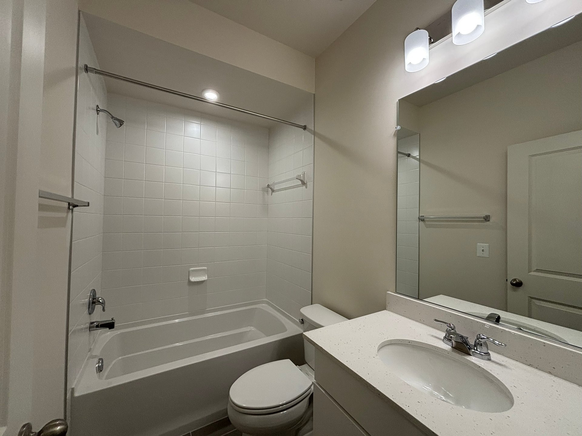 secondary bathroom with a tub/shower combo