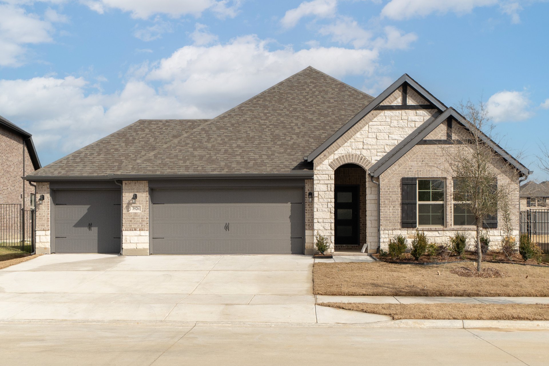 exterior with white and tan brick