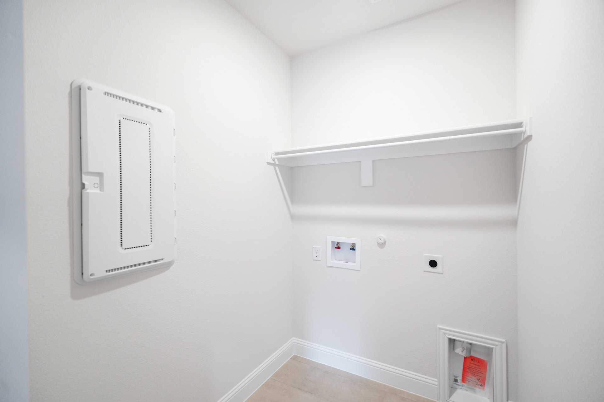laundry room with tile flooring