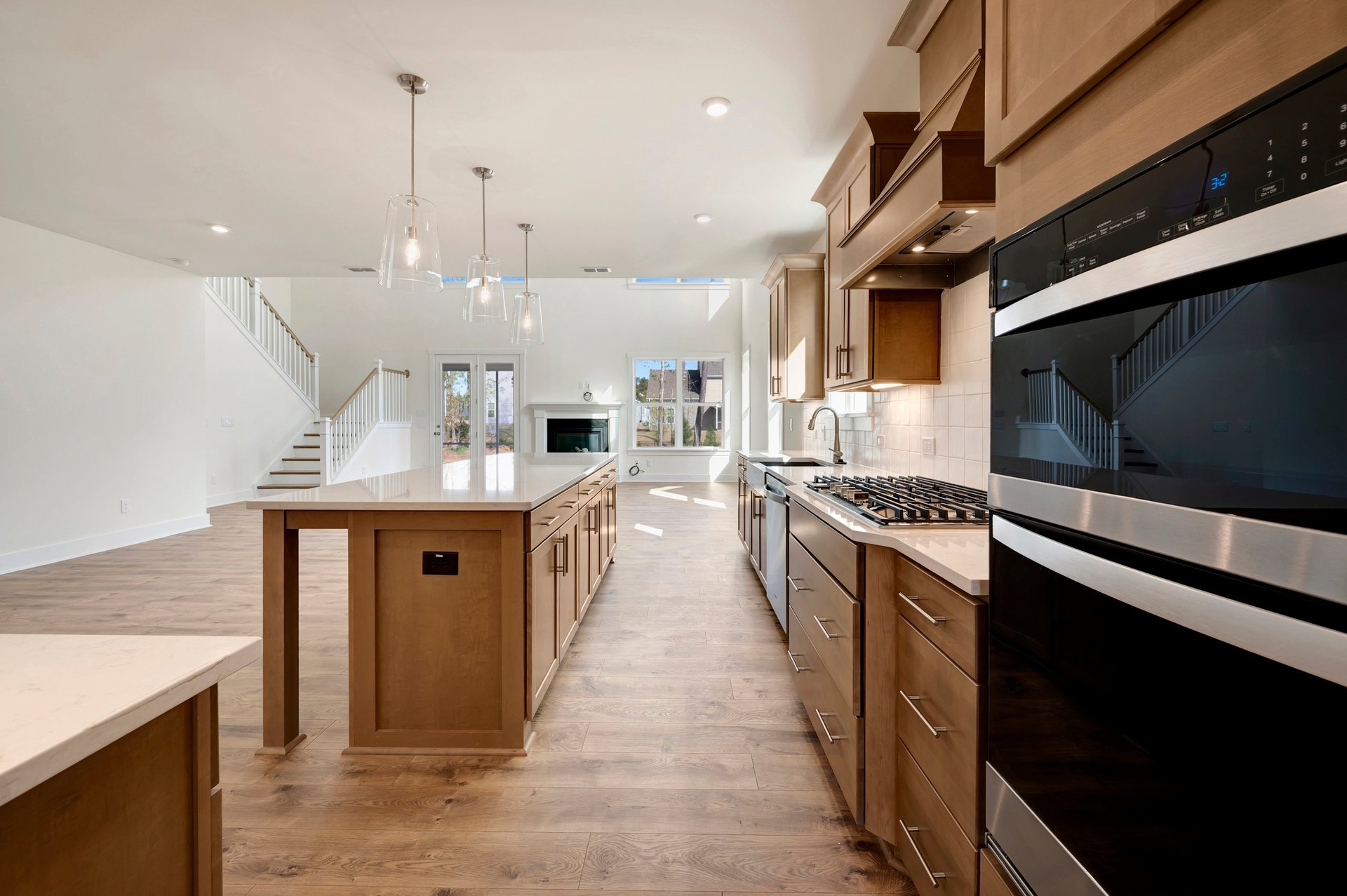 kitchen with stainless steel appliances and a view of the great room