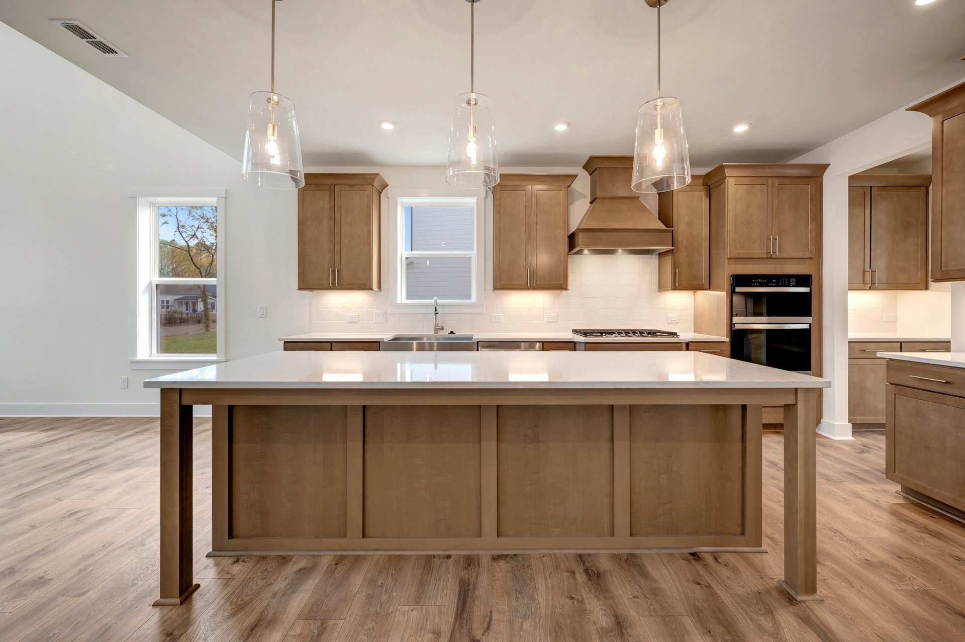 kitchen with an island and access to the breakfast area