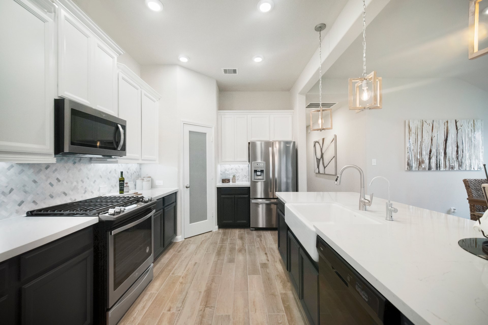kitchen with two-tone color cabinets