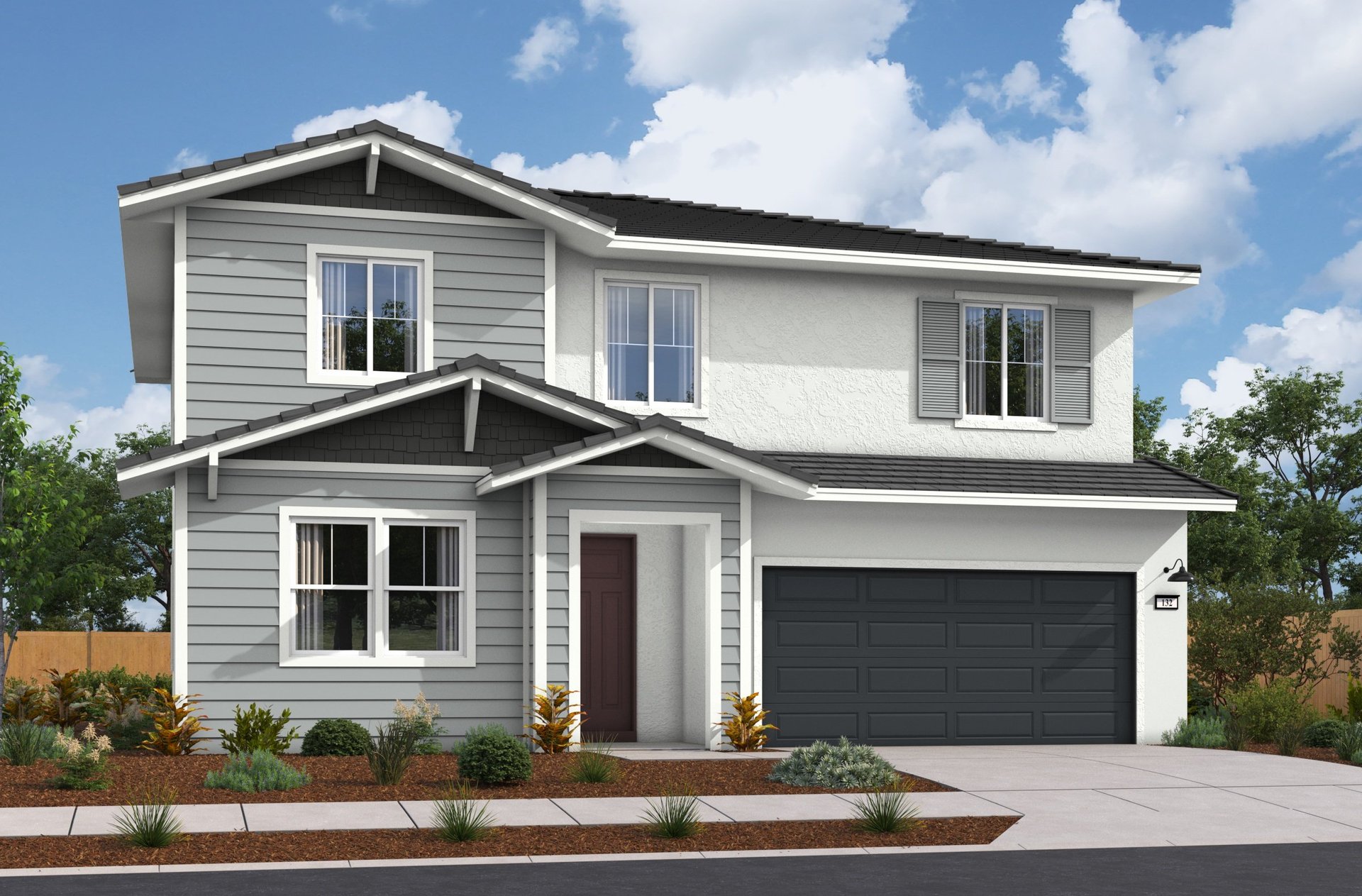 front of two-story gray and white home with covered entry porch