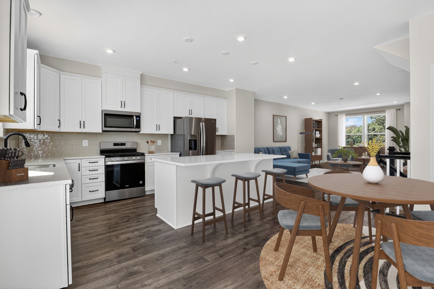 kitchen with a center island connecting to the breakfast area