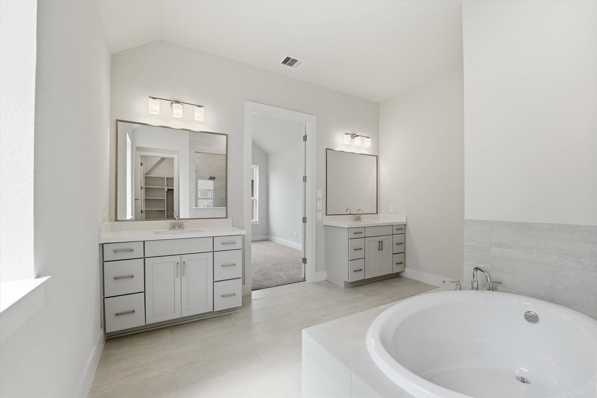 primary bathroom with double sinks