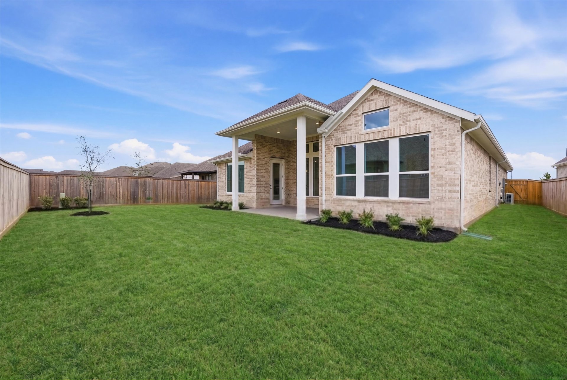 backyard of home with covered patio