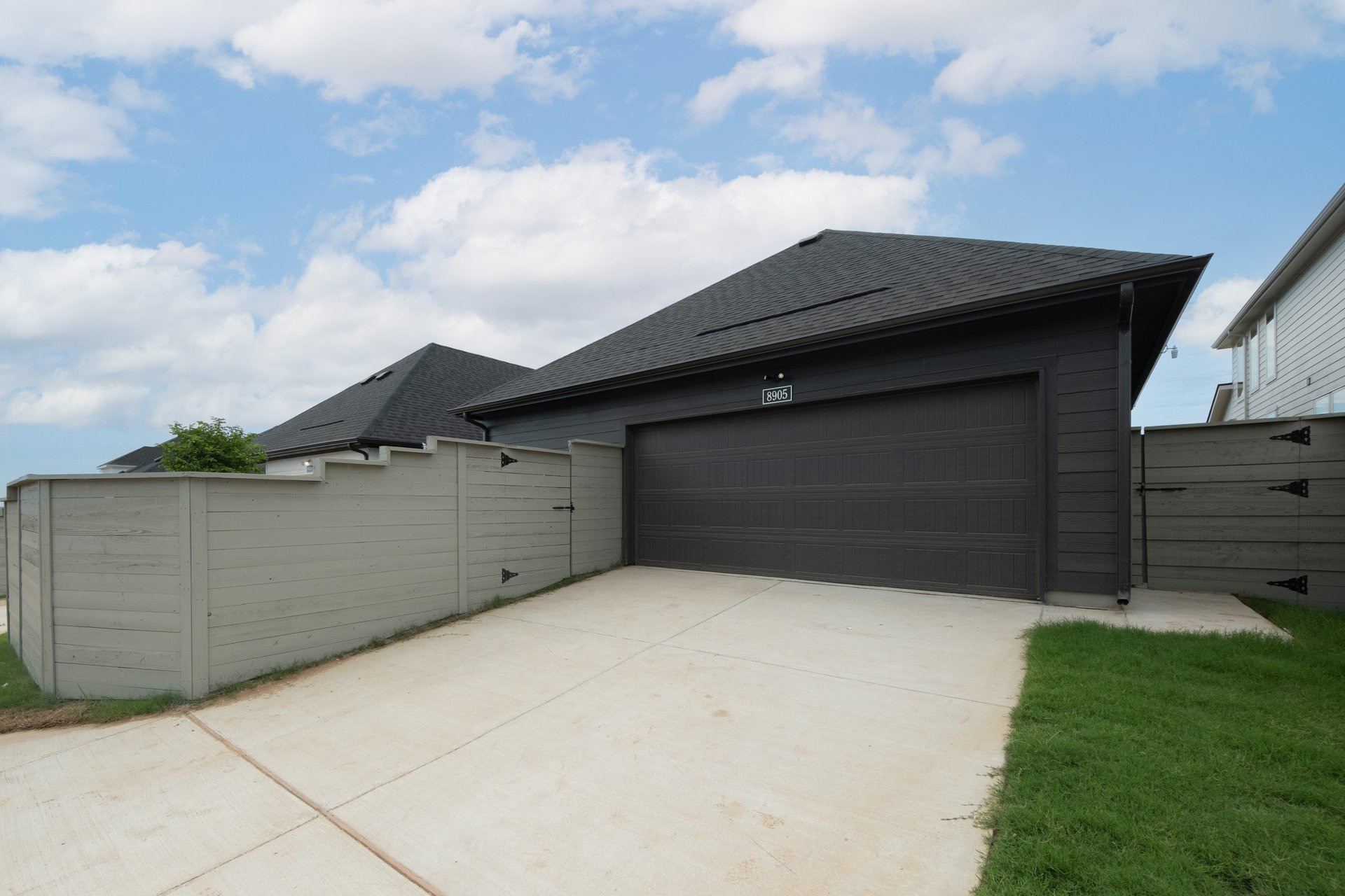 view of garage from alleyway
