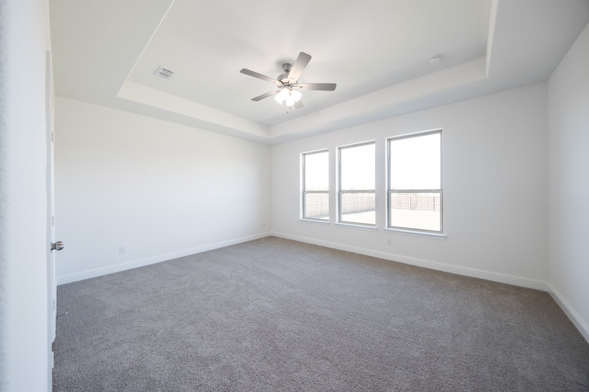 bedroom with carpet and ceiling fan 