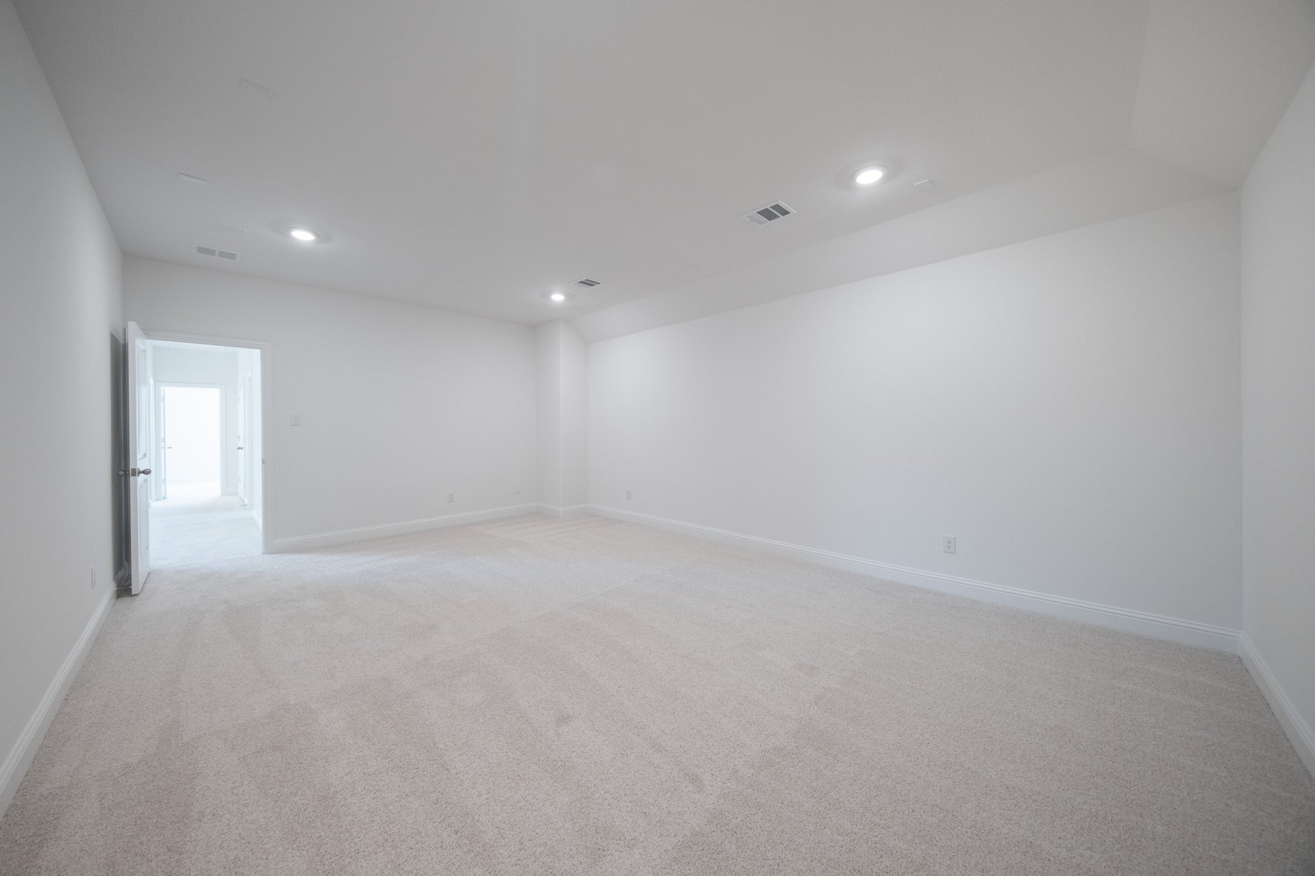 spacious media room with carpet and recessed lighting