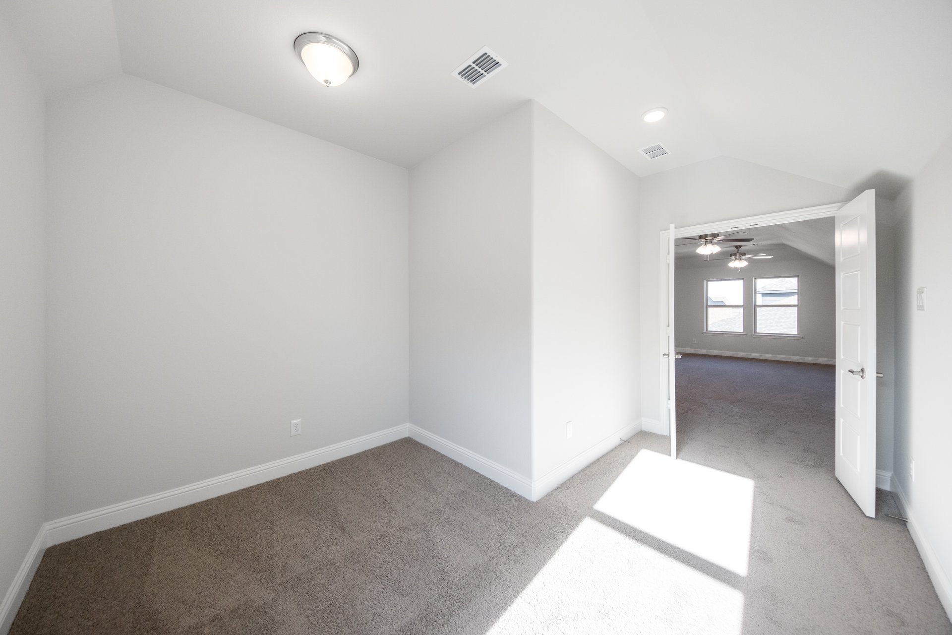 home office with carpet and french doors