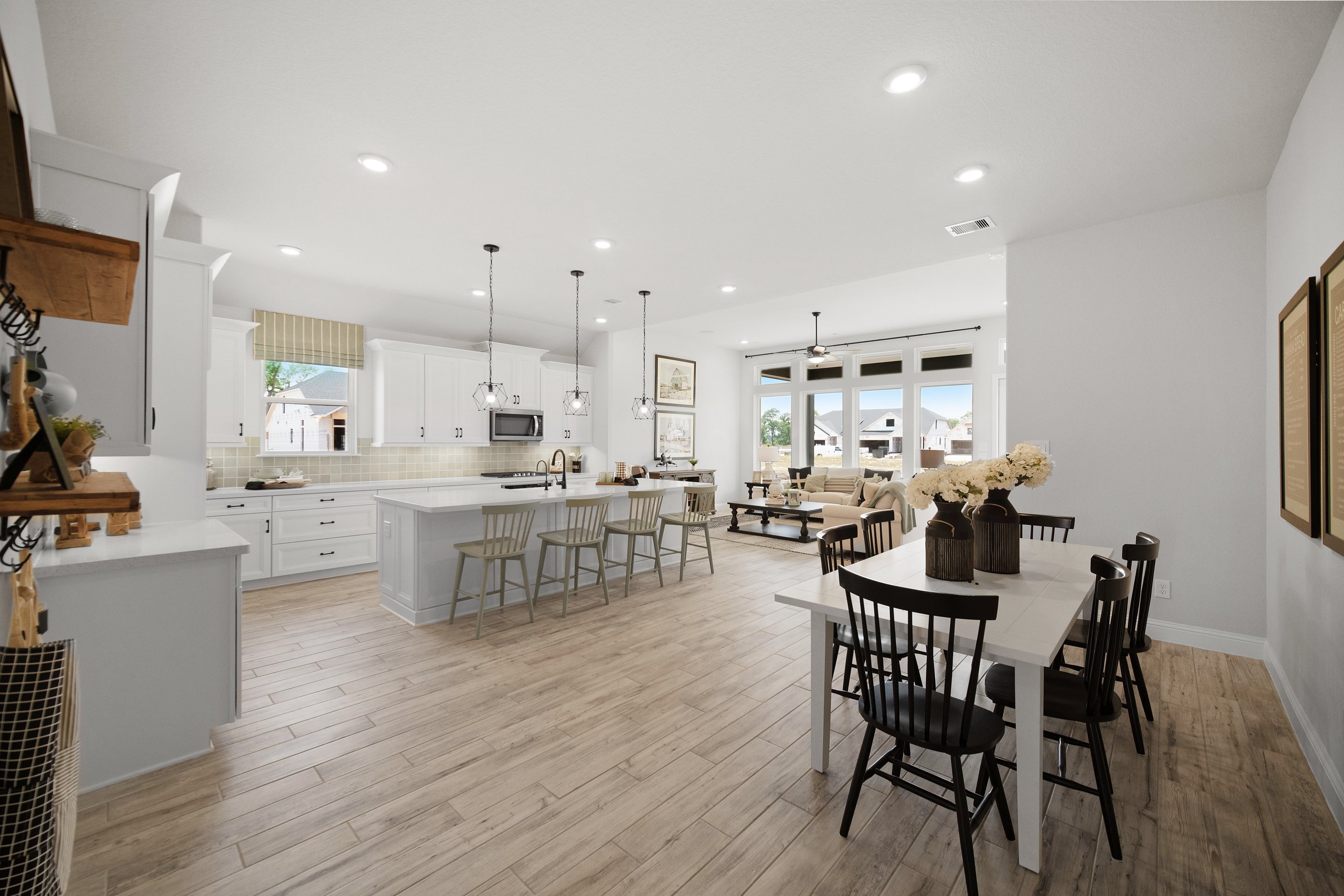 kitchen and dining area with hardwood flooring