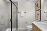 secondary bathroom with an oversized shower