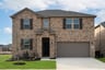 two-story home with brick and shutters